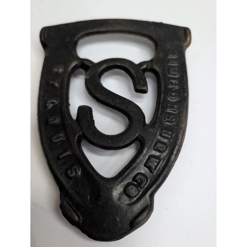 Simmons HDW Co St Louis Cast Iron Trivet
